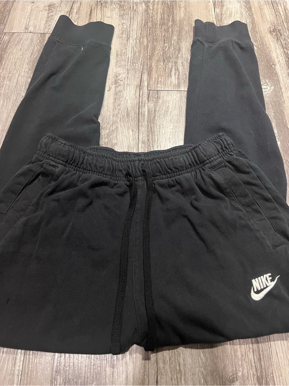 Nike black sweatpants with white logo Size S, small holes on front check pics